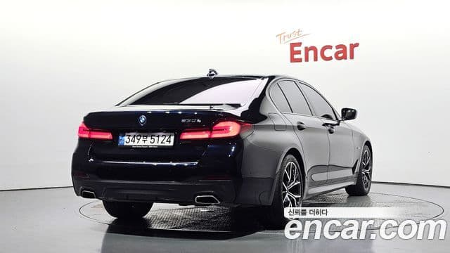 BMW 5 Series 2023 — ფოტო 19/36
