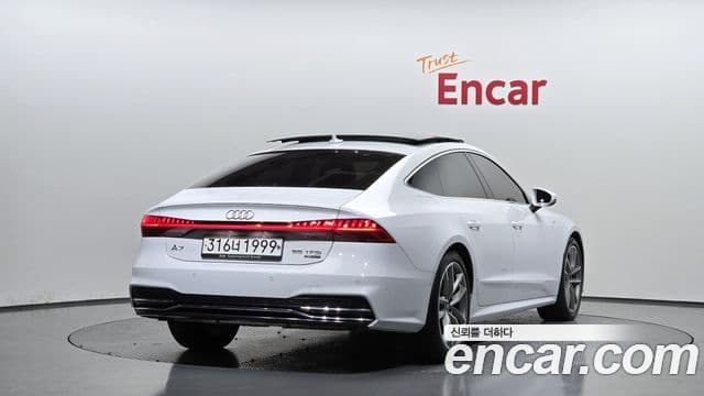 Audi A7 2020 — ფოტო 2/20