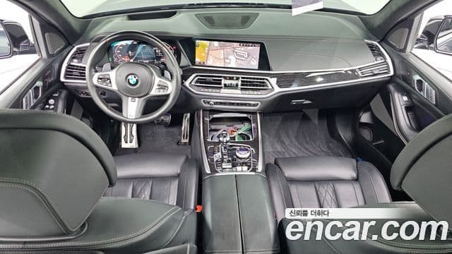 BMW X7 2020 — ფოტო 7/20
