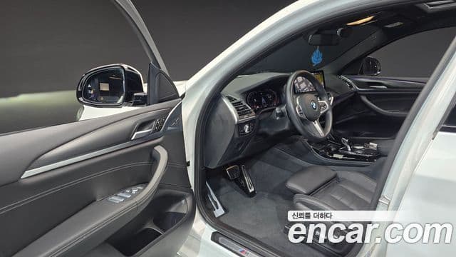 BMW X4 2022 — Фото 10/20