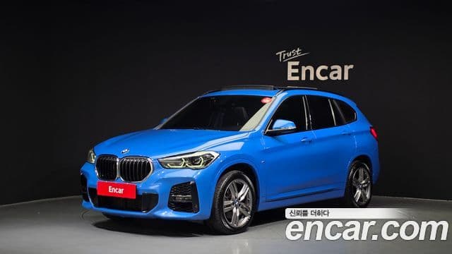 BMW X1 2021 — ფოტო 1/20