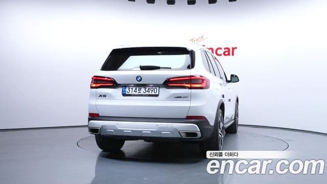 BMW X5 2023 — ფოტო 4/20