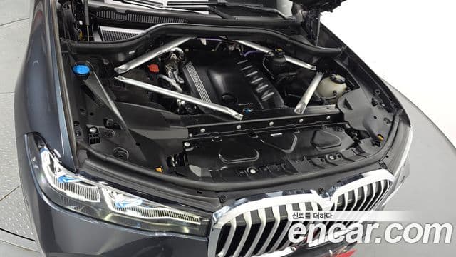 BMW X7 2022 — ფოტო 15/20