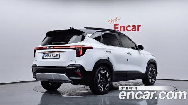 Kia Seltos 2024 — Şəkil 1/20