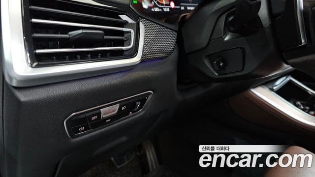 BMW X5 2023 — ფოტო 30/32
