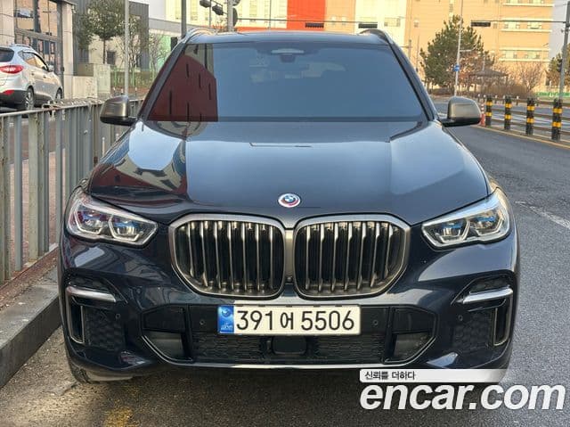 BMW X5 2023 — Фото 1/12