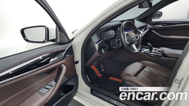 BMW 5 Series 2023 — ფოტო 10/20