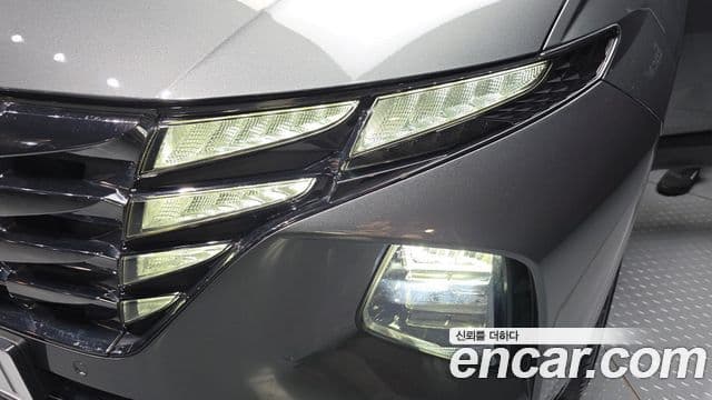 Hyundai Tucson Hybrid 2022 — ფოტო 7/33