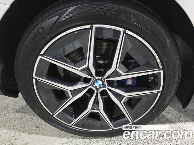 BMW 5 Series 2023 — ფოტო 4/20