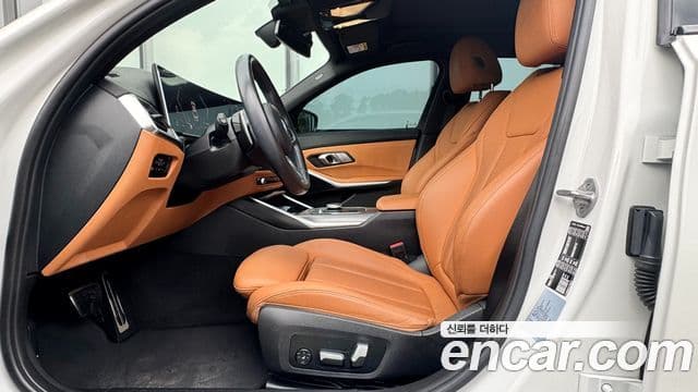 BMW 3 Series 2023 — фото 8 из 20