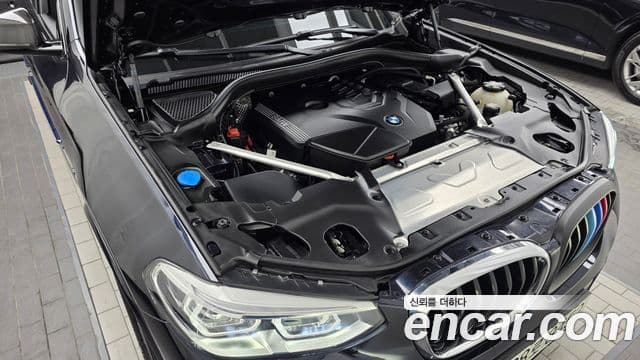 BMW X3 2021 — ფოტო 6/20