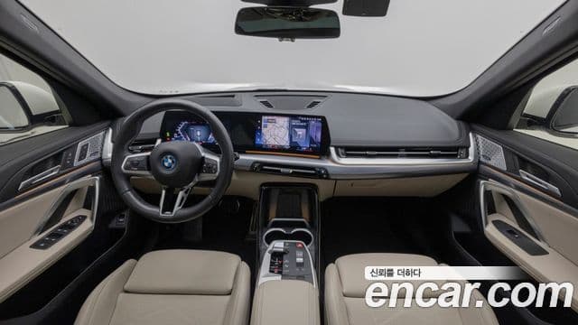 BMW iX1 2023 — ფოტო 6/20