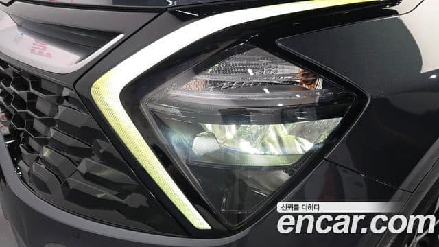 Kia Sportage 2024 — Photo 2/31