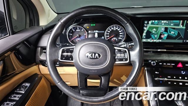 Kia Carnival 2021 — ფოტო 13/20