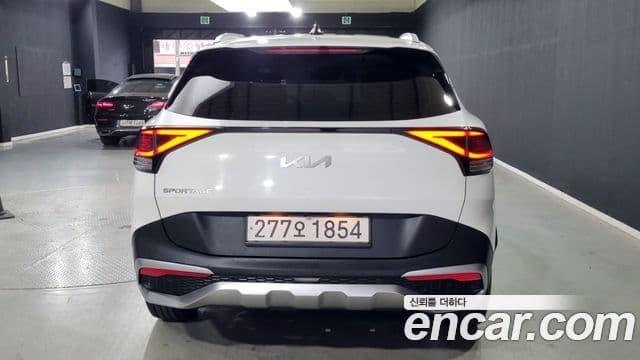 Kia Sportage 2021 — ფოტო 4/18