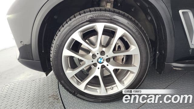 BMW X5 2021 — ფოტო 5/20