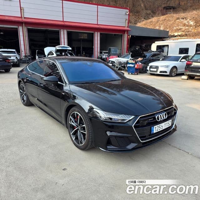 Audi A7 2021 — ფოტო 8/18