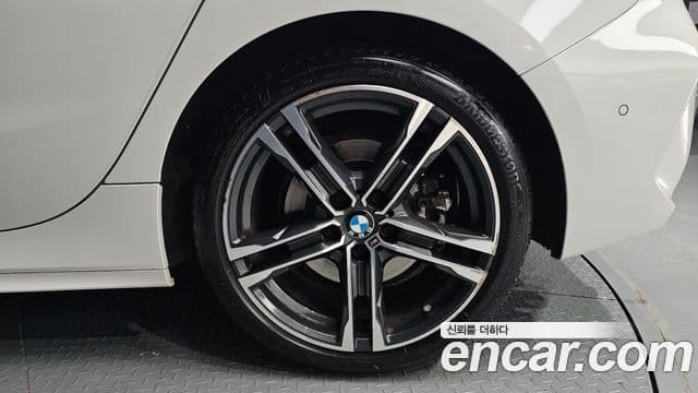 BMW 1 Series 2022 — ფოტო 26/31
