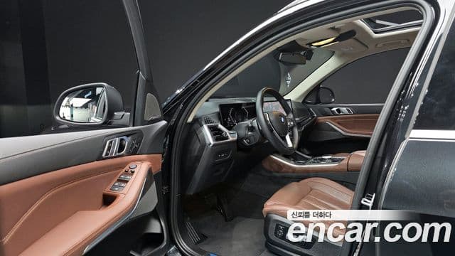 BMW X5 2024 — ფოტო 8/20