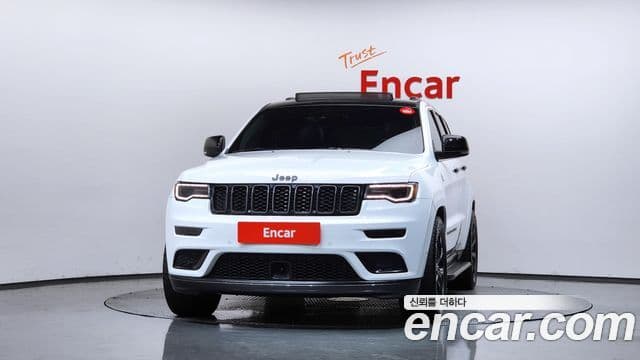 Jeep Grand Cherokee 2021 — Фото 2/20