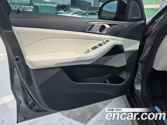 BMW X5 2025 — ფოტო 14/20