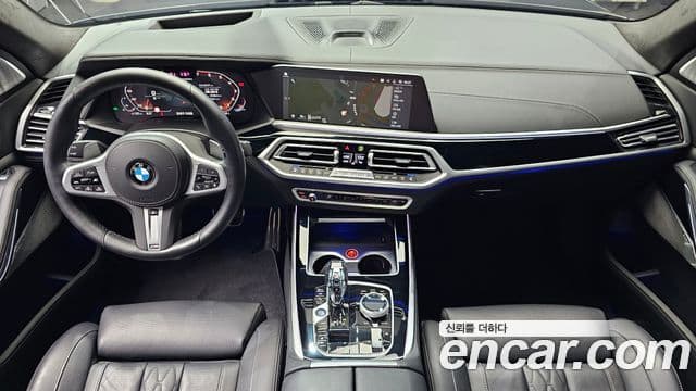 BMW X7 2021 — ფოტო 7/20