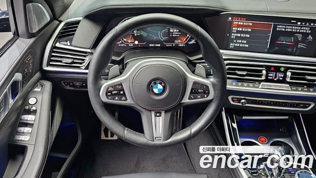 BMW X7 2021 — ფოტო 13/20