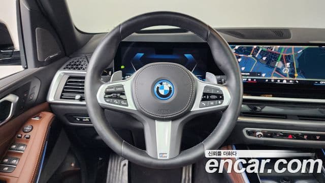 BMW X5 2024 — ფოტო 13/20