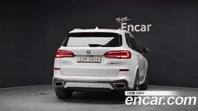 BMW X5 2019 — ფოტო 4/20