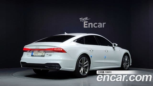 Audi A7 2021 — ფოტო 2/20