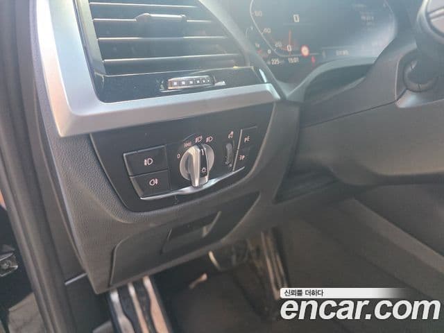 BMW X3 2021 — ფოტო 16/18