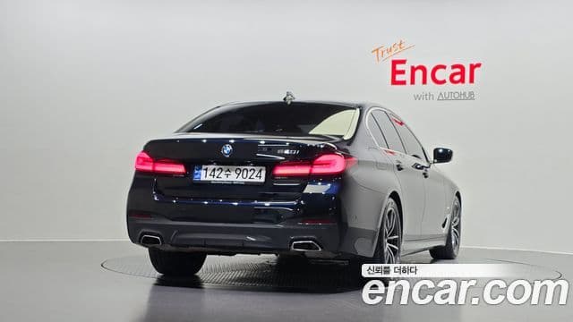 BMW 5 Series 2023 — ფოტო 4/20