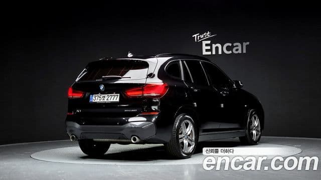 BMW X1 2021 — ფოტო 4/20