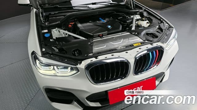 BMW X3 2021 — ფოტო 13/20