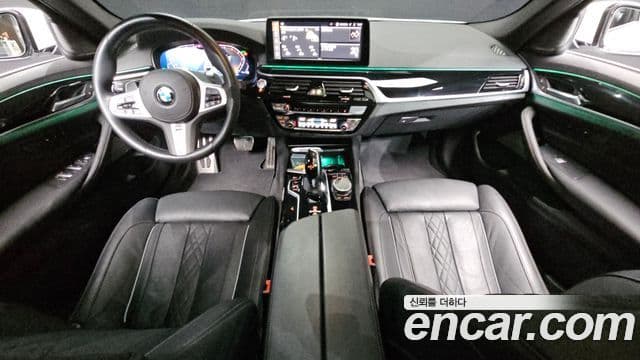 BMW 5 Series 2023 — ფოტო 7/20