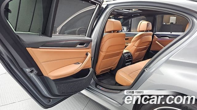 BMW 5 Series 2022 — Фото 12/20
