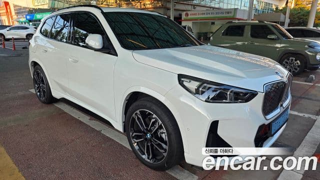 BMW iX1 2025 — ფოტო 13/20