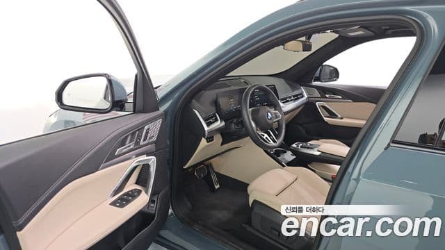 BMW iX1 2024 — ფოტო 15/20