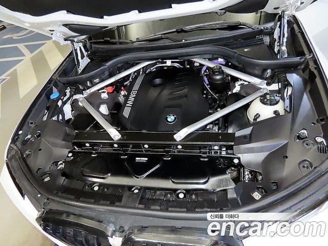 BMW X7 2023 — ფოტო 18/20