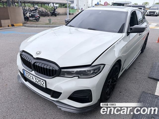 BMW 3 Series 2019 — ფოტო 1/9