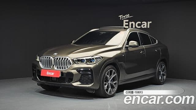 BMW X6 2022 — Фото 1/20