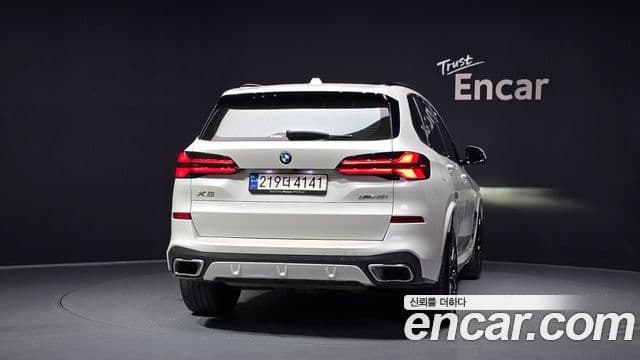 BMW X5 2023 — ფოტო 4/20
