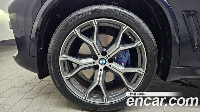 BMW X5 2021 — ფოტო 4/20