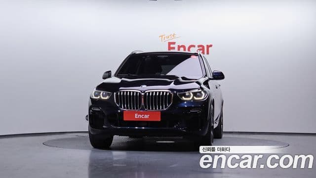 BMW X5 2021 — ფოტო 1/20