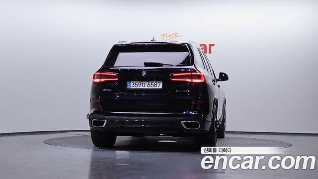 BMW X5 2021 — ფოტო 16/20