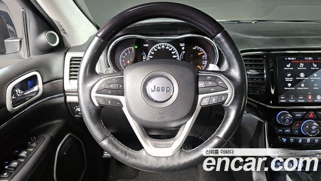 Jeep Grand Cherokee 2020 — ფოტო 13/20