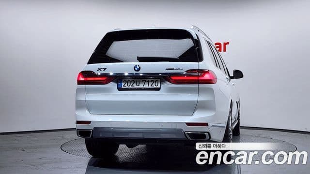 BMW X7 2022 — ფოტო 4/20