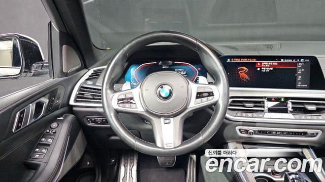 BMW X5 2021 — ფოტო 14/20