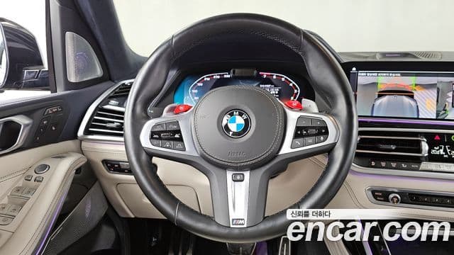 BMW X7 2022 — ფოტო 13/20