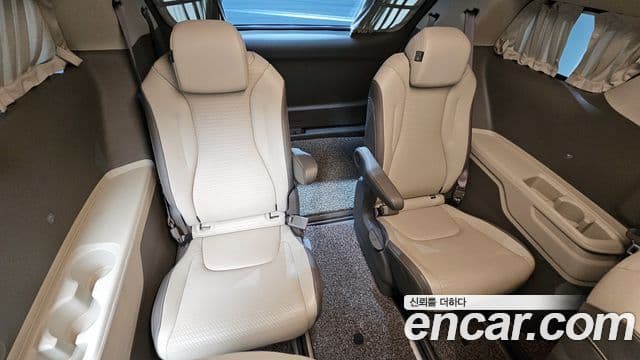 Kia Carnival 2021 — ფოტო 13/20